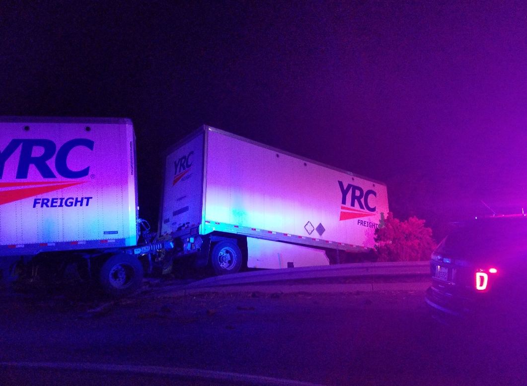 Police officers responded to big rig accident on Childs Avenue exit