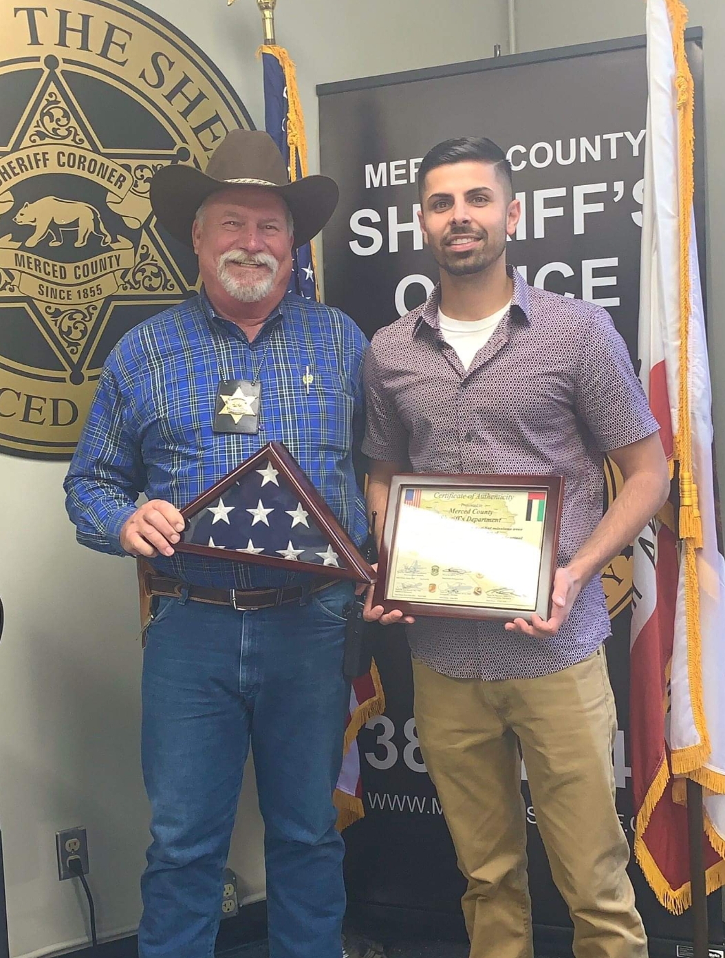 Flag flown over combat missions in Iraq presented to Merced Sheriff
