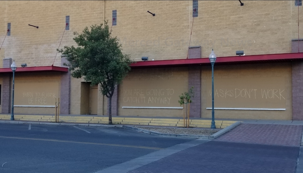 Writing Regarding COVID-19 Spotted On Downtown Merced Theater Wall