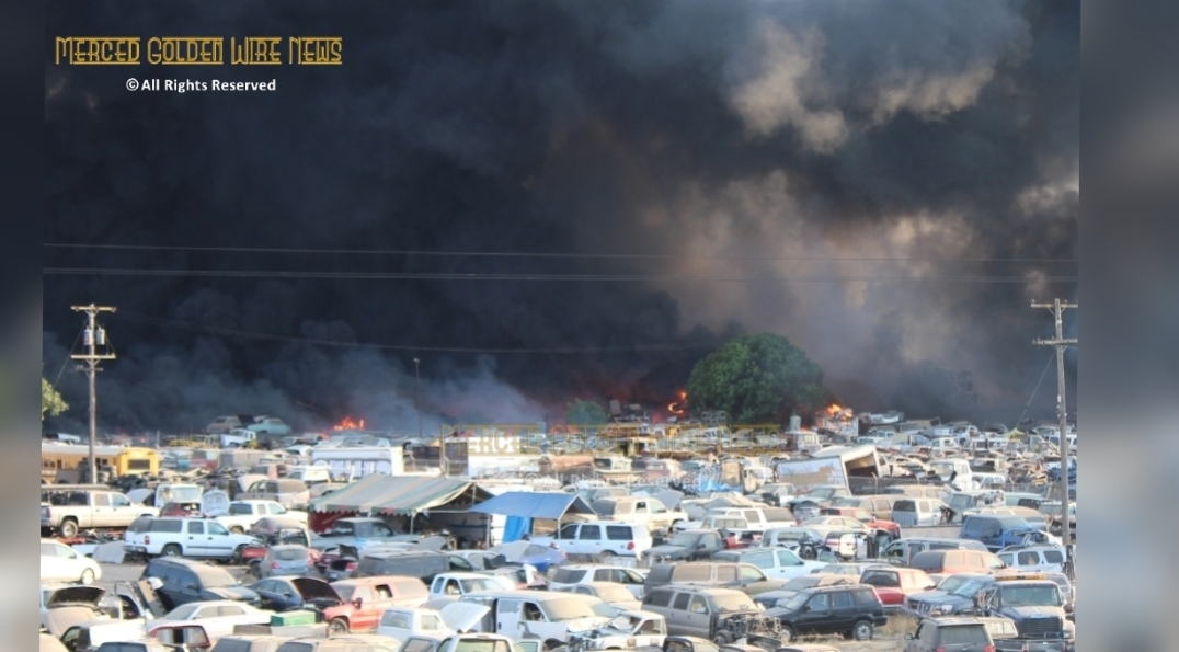 Fire in Merced burns over 100 cars, threatening homes, industrial, and agricultural properties
