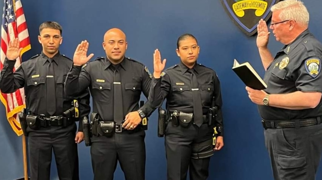 Three new police officers sworn in by Chief Cavallero at the Merced Police Department